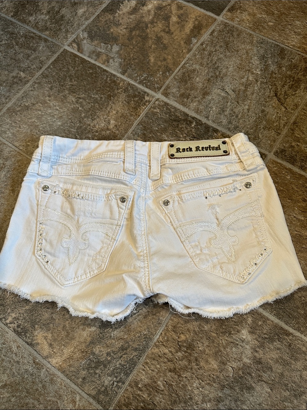 Rock Revival White Distressed Denim Cutoff Shorts with Embroidered Pockets